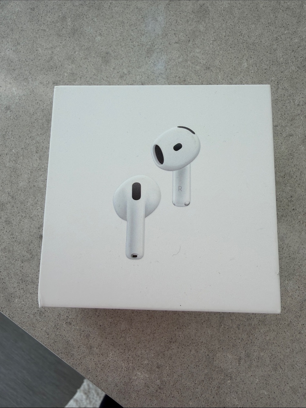 Apple AirPods 4 with active noise cancellation and charging case